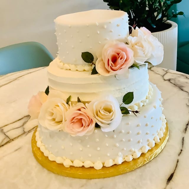 Lemon Mousse with Raspberries Wedding Cake - $8.99 per person starting 45 people.