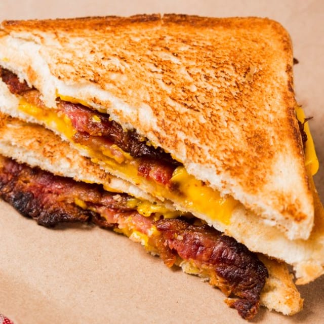 Ham Egg and Cheese Canadian Bacon on Croissant.