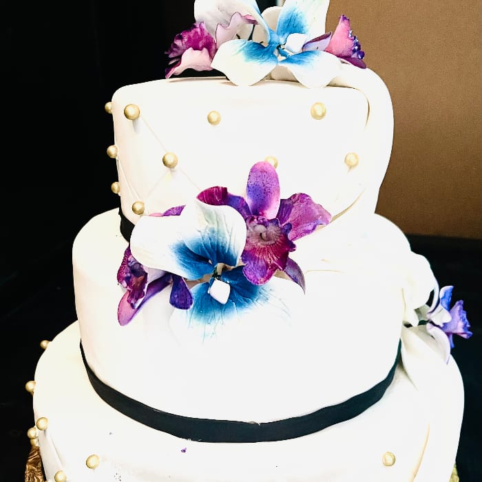 Passion Fruit Bavarian with Apricots Wedding Cake - $8.99 per person starting 45 people.